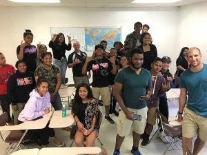 ECU archaeologists work with students in Saipan.